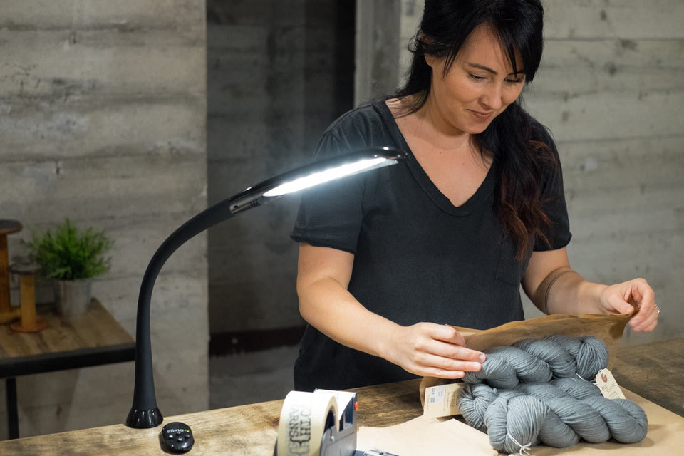 Women packing yarn with Stella